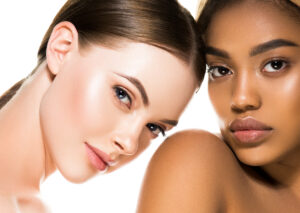 Two women showing the results of triLift facials in Alpharetta