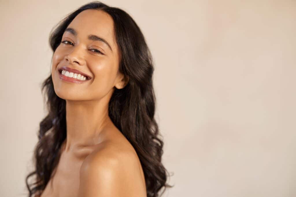 A woman smiling after an Erbium Pixel laser facial in Atlanta