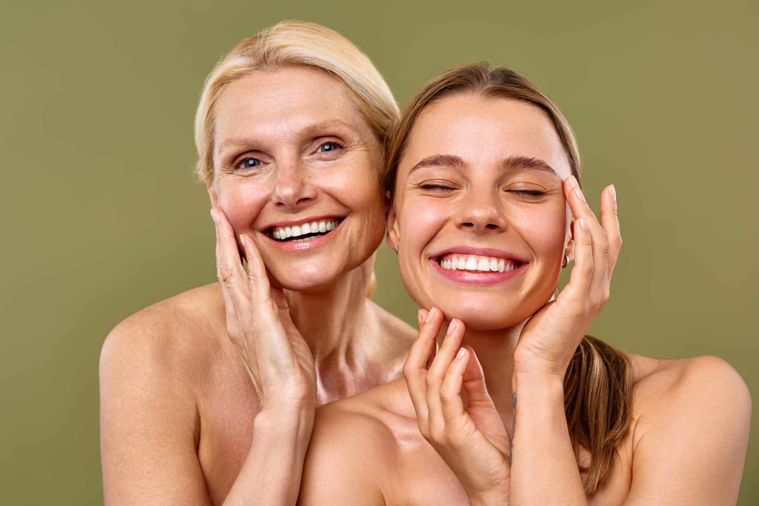 Two women smiling after a triLift facial in Atlanta