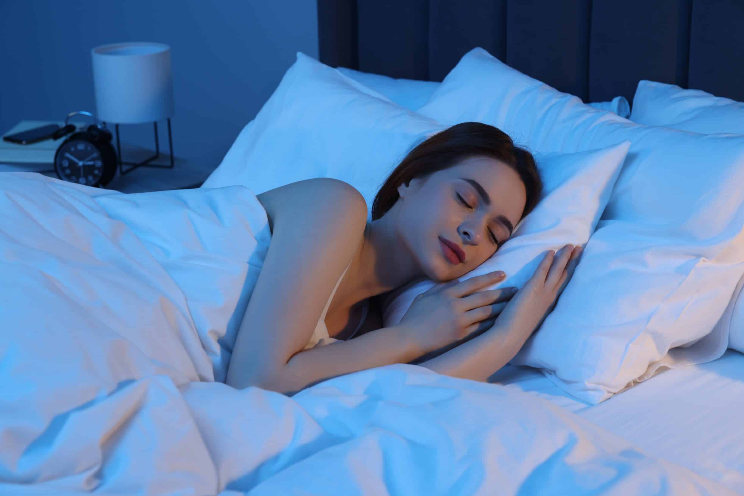 Sleep support therapy image A woman sleeping after using sleep management peptides in Atlanta