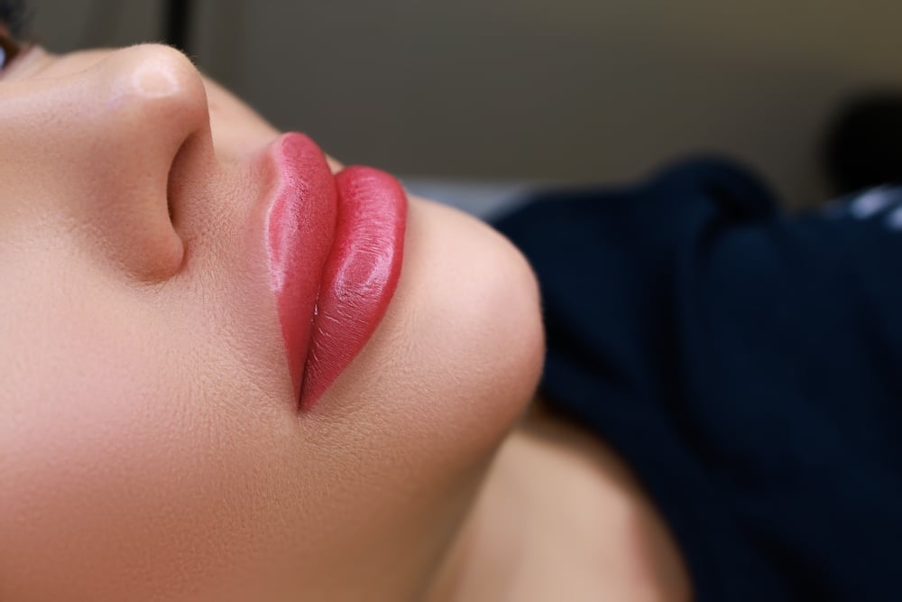 A close-up shot of a woman's lips after lip fillers in Atlanta