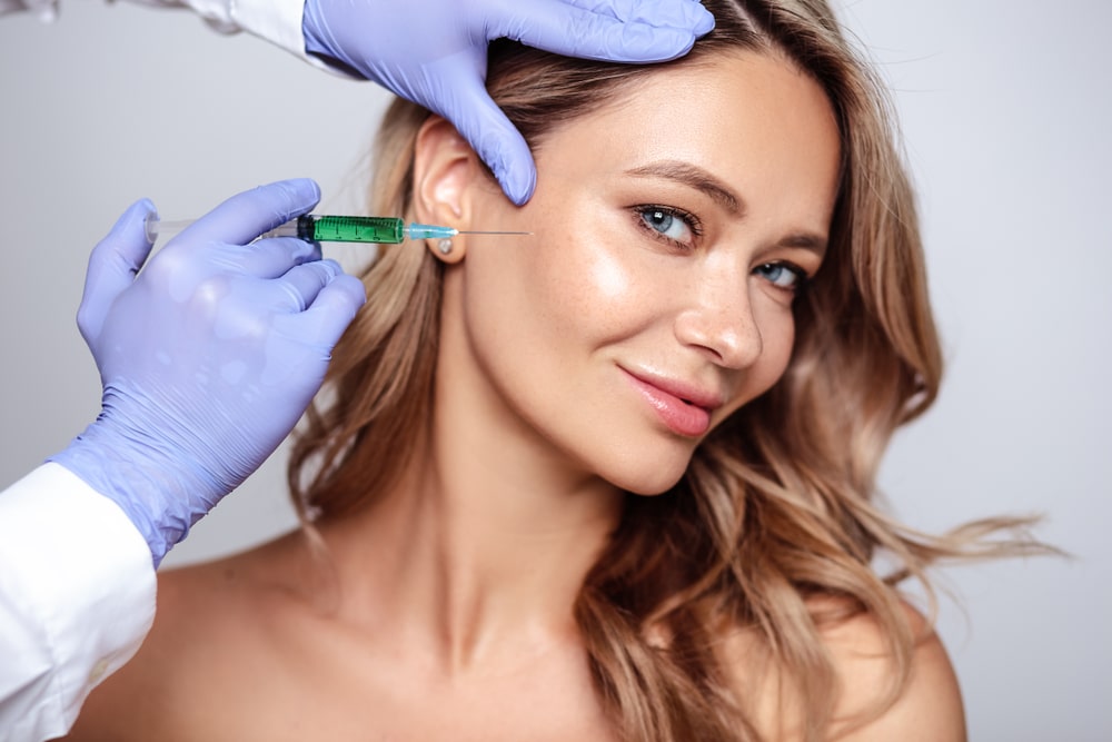 Woman getting JUVÉDERM® fillers in Atlanta Woman getting JUVÉDERM® fillers in Atlanta